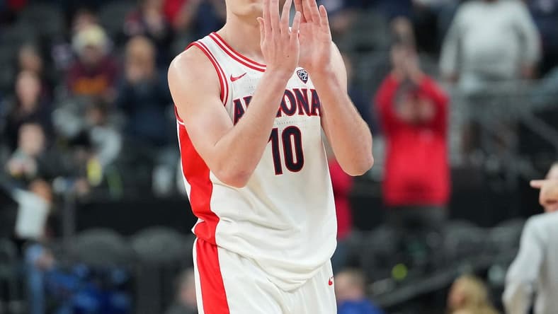 Mar 10, 2023; Las Vegas, NV, USA; Arizona Wildcats forward Azuolas Tubelis (10) applauds after the Wildcats defeated the Arizona State Sun Devils 78-59 at T-Mobile Arena. Mandatory Credit: Stephen R. Sylvanie-USA TODAY Sports