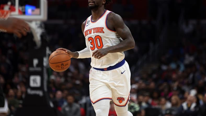 Mar 11, 2023; Los Angeles, California, USA;  New York Knicks forward Julius Randle (30) brings the ball up court during the third quarter against the Los Angeles Clippers at Crypto.com Arena. Mandatory Credit: Kiyoshi Mio-USA TODAY Sports