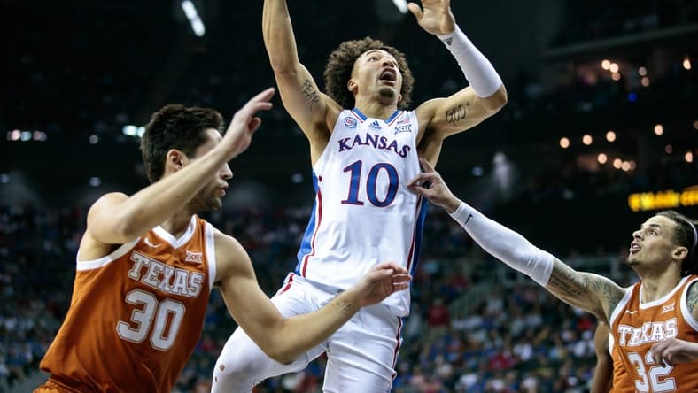 Mar 11, 2023; Kansas City, MO, USA; Kansas Jayhawks forward Jalen Wilson (10) puts up a shot during the first half against the Texas Longhorns at T-Mobile Center. Mandatory Credit: William Purnell-USA TODAY Sports