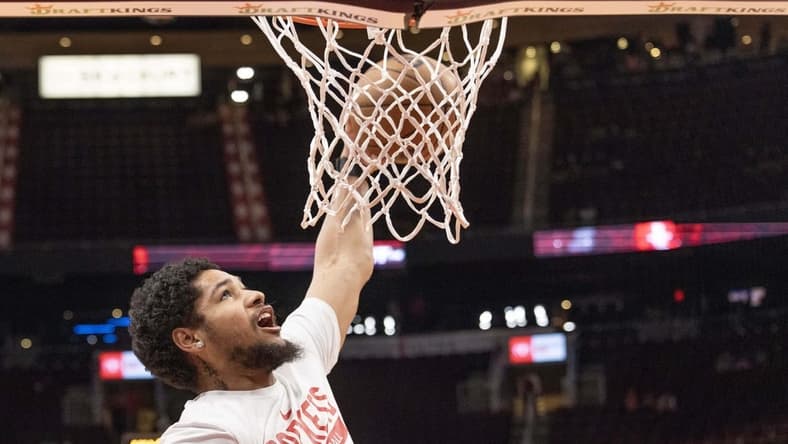 Mar 11, 2023; Houston, Texas, USA; Houston Rockets guard Daishen Nix (15) dunks during warms ups before playing against the Chicago Bulls at Toyota Center. Mandatory Credit: Thomas B. Shea-USA TODAY Sports
