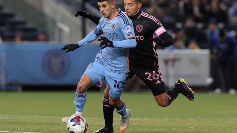 Mar 11, 2023; New York, New York, USA; New York City player Santiago Rodriguez (10) battles for the ball against Inter Miami midfielder Gregore (26) at Yankee Stadium. Mandatory Credit: Vincent Carchietta-USA TODAY Sports
