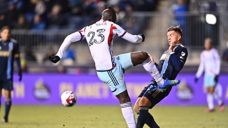 Mar 11, 2023; Philadelphia, Pennsylvania, USA; Chicago Fire FC defender Kei Kamara (23) and Philadelphia Union defender Kai Wagner (27) battle for the ball during the first half at Subaru Park. Mandatory Credit: Kyle Ross-USA TODAY Sports