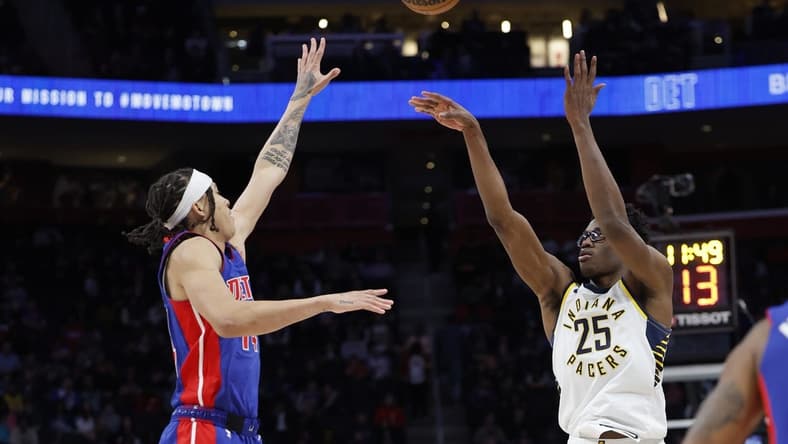 Mar 11, 2023; Detroit, Michigan, USA;  Indiana Pacers forward Jalen Smith (25) shoots the ball against Detroit Pistons guard R.J. Hampton (14) in the second half at Little Caesars Arena. Mandatory Credit: Rick Osentoski-USA TODAY Sports