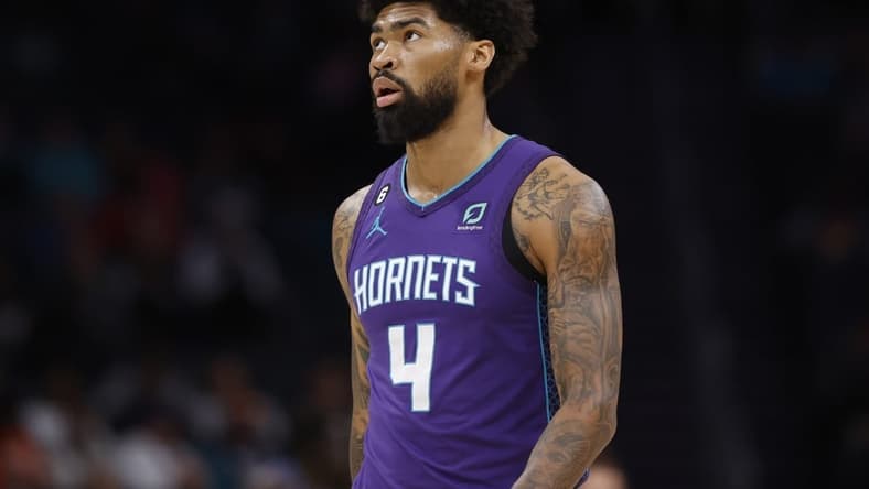 Mar 11, 2023; Charlotte, North Carolina, USA; Charlotte Hornets center Nick Richards (4) looks up at the scoreboard during the first half against the Utah Jazz at Spectrum Center. Mandatory Credit: Brian Westerholt-USA TODAY Sports