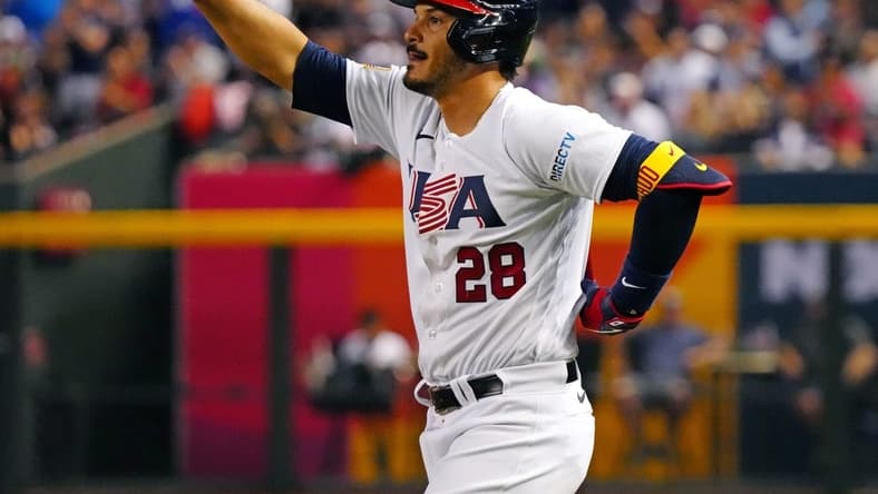 March 11, 2023; Phoenix, Ariz; USA; USA third baseman Nolan Arenado (28) celebrates getting on base against Great Britain during the World Baseball Classic at Chase Field.
Baseball World Baseball Classic Opening Day