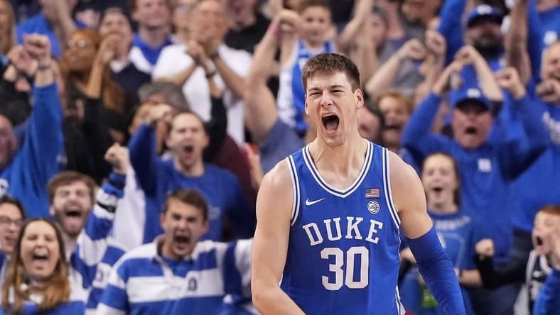 Mar 11, 2023; Greensboro, NC, USA;  Duke Blue Devils center Kyle Filipowski (30) reacts after scoring in the second half of the Championship game of the ACC Tournament at Greensboro Coliseum. Mandatory Credit: Bob Donnan-USA TODAY Sports
