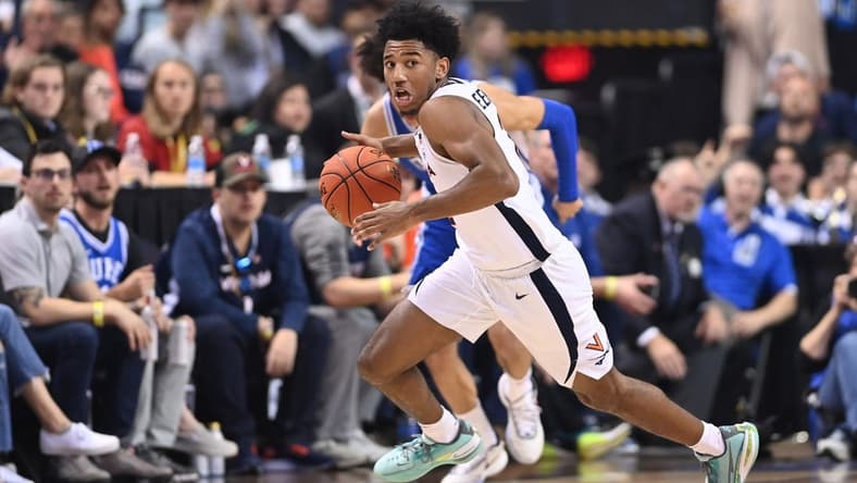 Mar 11, 2023; Greensboro, NC, USA; Virginia Cavaliers guard Reece Beekman (2) dribbles in the second half of the Championship game of the ACC Tournament at Greensboro Coliseum. Mandatory Credit: Bob Donnan-USA TODAY Sports