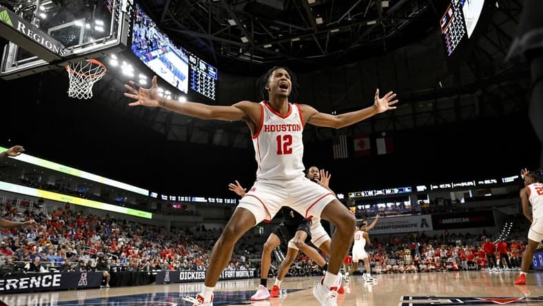 Mar 12, 2023; Fort Worth, TX, USA; Houston Cougars guard Tramon Mark (12) defends against the Memphis Tigers in bound pass during the second half at Dickies Arena. Mandatory Credit: Jerome Miron-USA TODAY Sports