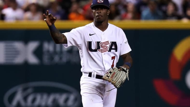 Mar 12, 2023; Phoenix, Arizona, USA; Team USA infielder Tim Anderson (7) celebrates after three strikes against Team Mexico at Chase Field. Mandatory Credit: Zachary BonDurant-USA TODAY Sports
