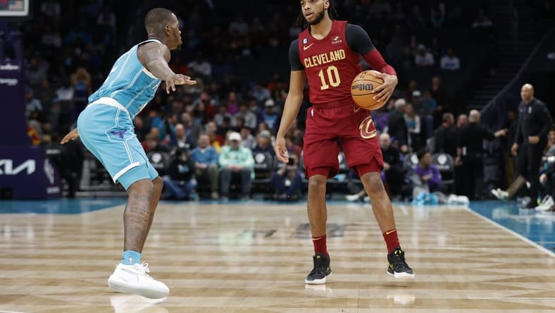 Mar 12, 2023; Charlotte, North Carolina, USA; Cleveland Cavaliers guard Darius Garland (10) is guarded by Charlotte Hornets guard Terry Rozier (3) during the first half at Spectrum Center. Mandatory Credit: Brian Westerholt-USA TODAY Sports