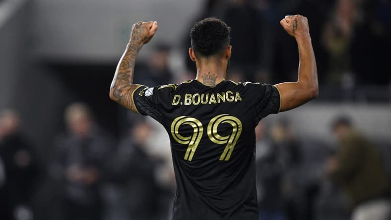 Mar 12, 2023; Los Angeles, California, USA; Los Angeles FC forward Denis Bouanga (99) celebrates after scoring a goal during the second half against the New England Revolution at BMO Stadium. Mandatory Credit: Orlando Ramirez-USA TODAY Sports