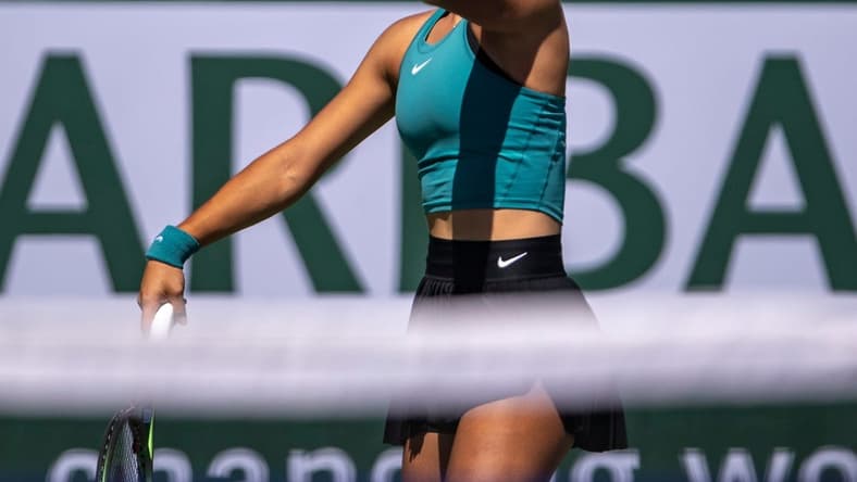 Emma Raducanu of Great Britain prepares a serve to Beatriz Haddad Maia of Brazil during their third-round match at the BNP Paribas Open at the Indian Wells Tennis Garden in Indian Wells, Calif., Monday, March 13, 2023.