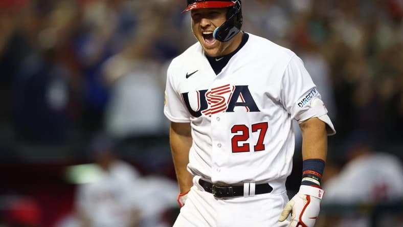 Mar 13, 2023; Phoenix, Arizona, USA; USA outfielder Mike Trout celebrates after hitting a three run home run in the first inning against Canada during the World Baseball Classic at Chase Field. Mandatory Credit: Mark J. Rebilas-USA TODAY Sports
