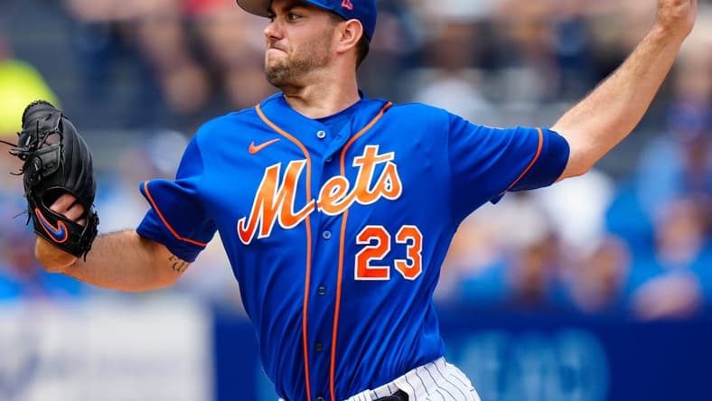 Mar 14, 2023; Port St. Lucie, Florida, USA; New York Mets starting pitcher David Peterson (23) throws a pitch against the Washington Nationals during the first inning at Clover Park. Mandatory Credit: Rich Storry-USA TODAY Sports