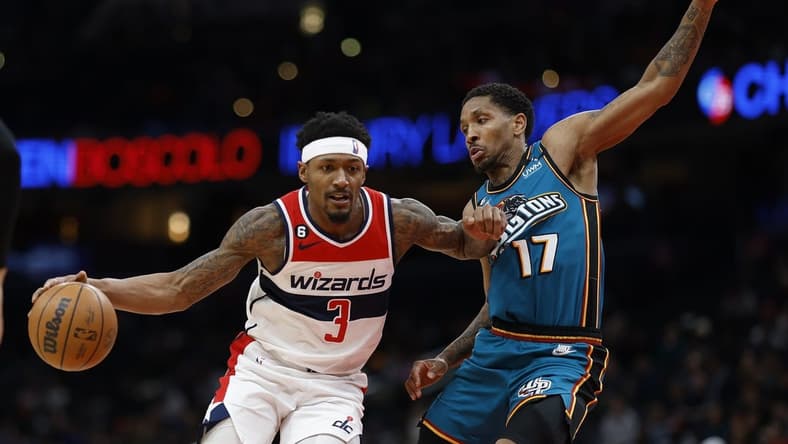 Mar 14, 2023; Washington, District of Columbia, USA; Washington Wizards guard Bradley Beal (3) drives to the basket as Detroit Pistons guard Rodney McGruder (17) defends in the third quarter at Capital One Arena. Mandatory Credit: Geoff Burke-USA TODAY Sports
