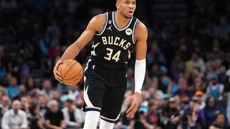 Mar 14, 2023; Phoenix, Arizona, USA; Milwaukee Bucks forward Giannis Antetokounmpo (34) dribbles against the Phoenix Suns during the second half at Footprint Center. Mandatory Credit: Joe Camporeale-USA TODAY Sports