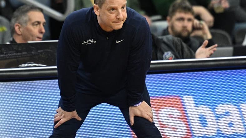 Mar 7, 2023; Sioux Falls, SD, USA; Oral Roberts Golden Eagles head coach Paul Mills watches action against the North Dakota State Bison in the first half at Denny Sanford Premier Center. Mandatory Credit: Steven Branscombe-USA TODAY Sports