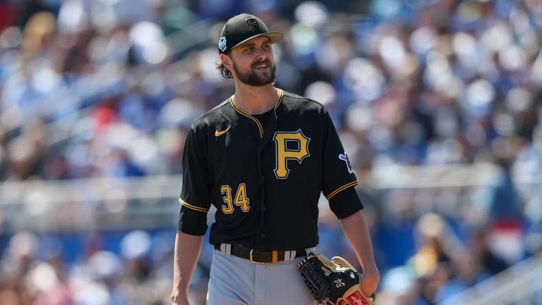 Mar 15, 2023; Dunedin, Florida, USA; Pittsburgh Pirates starting pitcher JT Brubaker (34) looks on after a stop in play against the Toronto Blue Jays in the third inning during spring training at TD Ballpark. Mandatory Credit: Nathan Ray Seebeck-USA TODAY Sports