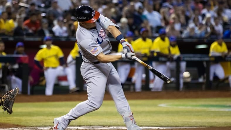 Mar 15, 2023; Phoenix, Arizona, USA; USA outfielder Mike Trout hits a two run single in the fifth inning against Colombia during the World Baseball Classic at Chase Field. Mandatory Credit: Mark J. Rebilas-USA TODAY Sports