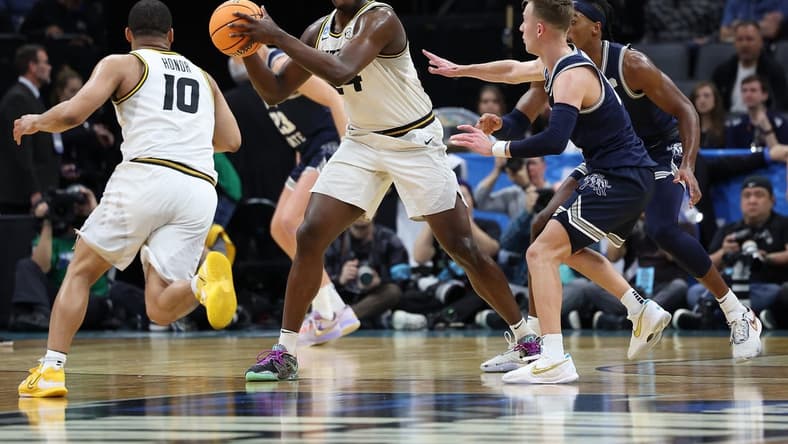 Mar 16, 2023; Sacramento, CA, USA; Missouri Tigers guard Kobe Brown (24) controls the ball against the Utah State Aggies during the first half at Golden 1 Center. Mandatory Credit: Kelley L Cox-USA TODAY Sports