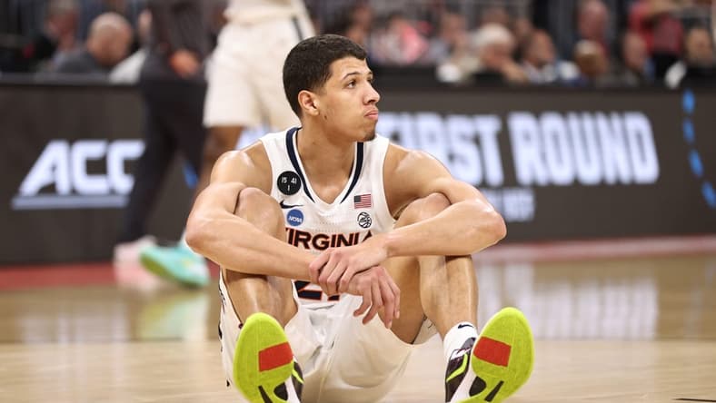 Mar 16, 2023; Orlando, FL, USA; Virginia Cavaliers forward Kadin Shedrick (21) reacts after the loss against the Furman Paladins during the second half at Amway Center. Mandatory Credit: Matt Pendleton-USA TODAY Sports