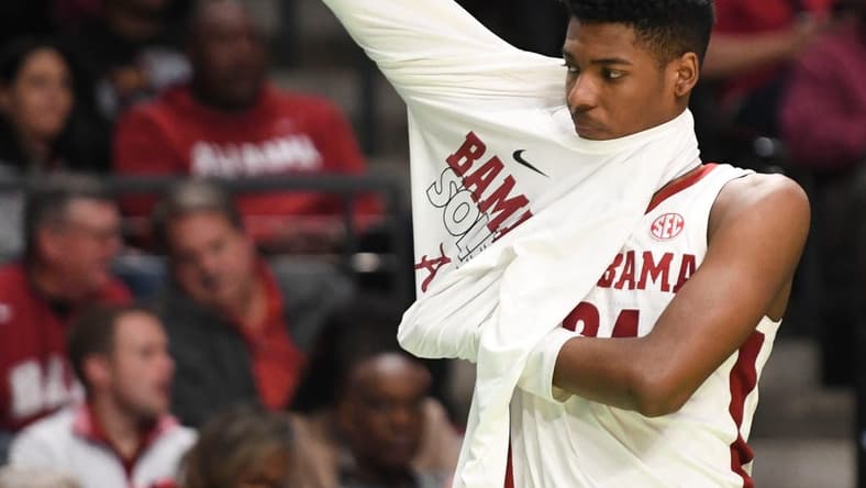 Mar 16, 2023; Birmingham, AL, USA; Alabama forward Brandon Miller (24), who was held scoreless, puts on a warmup after coming to the bench in the second half at Legacy Arena. Alabama advanced to the second round of the NCAA Tournament with a 96-75 win over Texas A&M Corpus Christi. Mandatory Credit: Gary Cosby Jr.-Tuscaloosa News
Ncaa Basketball Ncaa Tournament Alabama Vs Texas A M Corpus Christi
