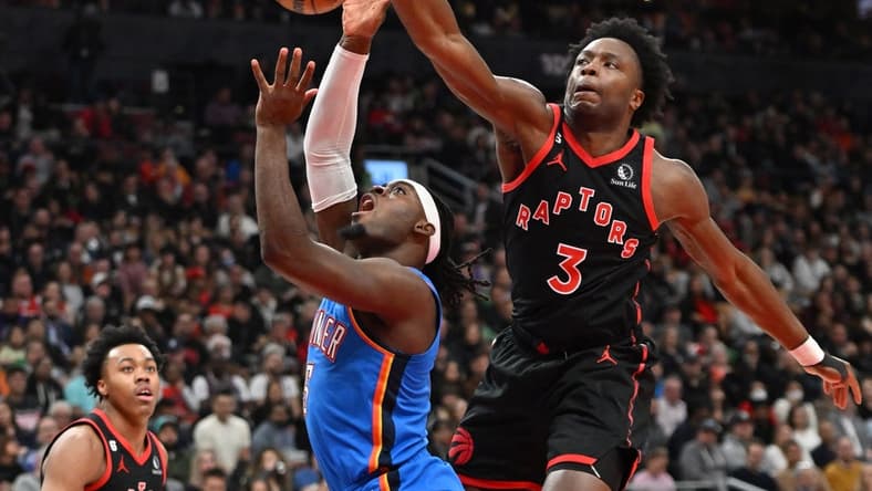 Mar 16, 2023; Toronto, Ontario, CAN; Toronto Raptors forward OG Anunoby (3) blocks a shot from Oklahoma City Thunder guard Luguentz Dort (5) in the first half at Scotiabank Arena. Mandatory Credit: Dan Hamilton-USA TODAY Sports