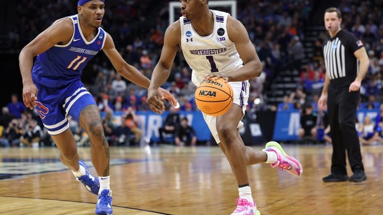 Mar 16, 2023; Sacramento, CA, USA; Northwestern Wildcats guard Chase Audige (1) controls the ball against Boise State Broncos forward Chibuzo Agbo (11) in the second half at Golden 1 Center. Mandatory Credit: Kelley L Cox-USA TODAY Sports