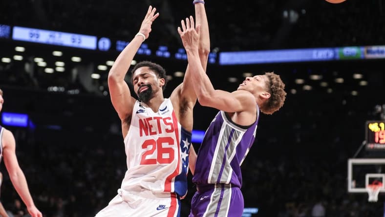Mar 16, 2023; Brooklyn, New York, USA;  Brooklyn Nets guard Spencer Dinwiddie (26) collides with Sacramento Kings forward Kessler Edwards (17) in the fourth quarter at Barclays Center. Mandatory Credit: Wendell Cruz-USA TODAY Sports