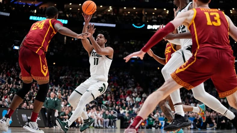 Mar 17, 2023; Columbus, Ohio, USA; Michigan State Spartans guard A.J. Hoggard (11) lobs a pass over USC Trojans forward Joshua Morgan (24) during the first round of the NCAA men s basketball tournament at Nationwide Arena. Mandatory Credit: Adam Cairns-The Columbus Dispatch
Basketball Ncaa Men S Basketball Tournament