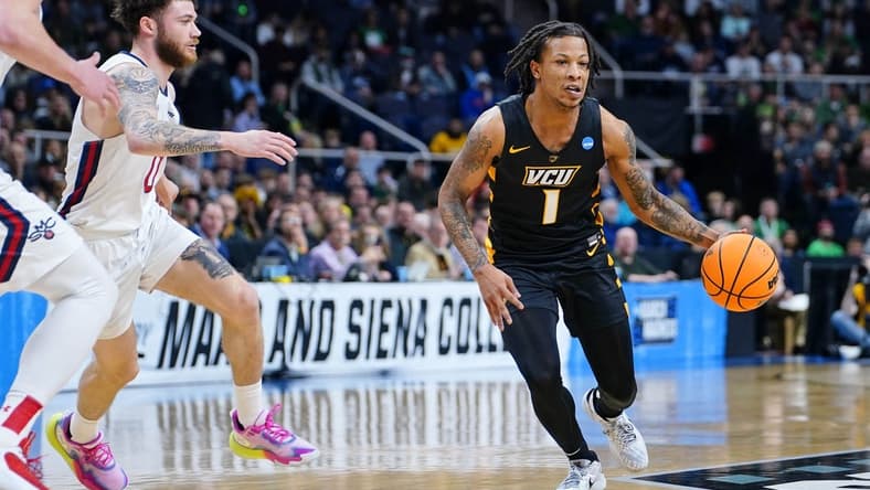Mar 17, 2023; Albany, NY, USA; Virginia Commonwealth Rams guard Adrian Baldwin Jr. (1) dribbles the ball against the St. Mary's Gaels during the first half at MVP Arena. Mandatory Credit: Gregory Fisher-USA TODAY Sports