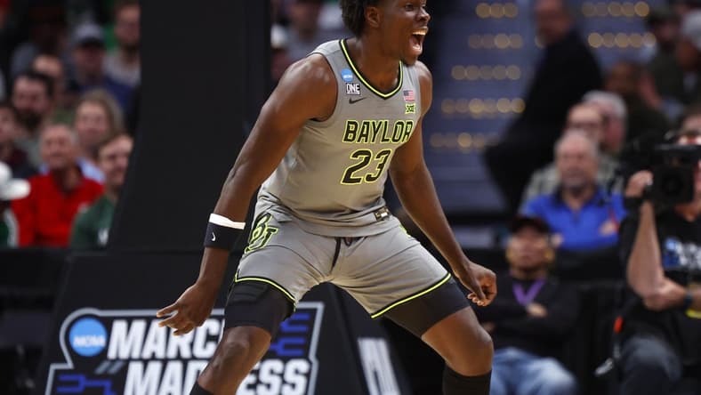 Mar 17, 2023; Denver, CO, USA; Baylor Bears forward Jonathan Tchamwa Tchatchoua (23) reacts to a play during the second half against UC Santa Barbara Gauchos in the first round of the 2023 NCAA men s basketball tournament at Ball Arena. Mandatory Credit: Michael Ciaglo-USA TODAY Sports