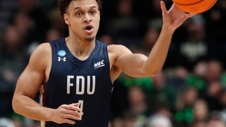 Fairleigh Dickinson Knights guard Grant Singleton (4) passes the ball during the NCAA Men s Basketball Tournament game against the Purdue Boilermakers, Friday, March 17, 2023, at Nationwide Arena in Columbus, Ohio. Fairleigh Dickinson Knights won 63-58.
Purduefairleigh031723 Am157