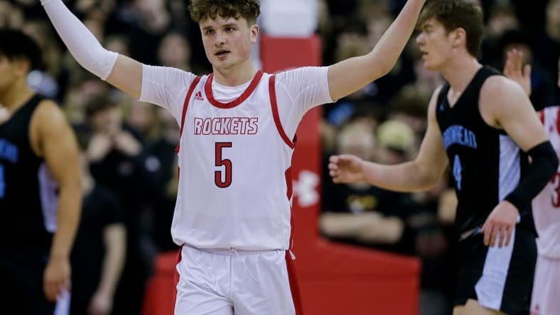 Neenah High School's Cal Klesmit (5) pumps up the crowd against Arrowhead High School during a WIAA Division 1 state semifinal boys basketball game on Friday, March 17, 2023, at the Kohl Center in Madison, Wis. Arrowhead won the game, 73-61, to advance to the state championship game.Tork Mason/USA TODAY NETWORK-Wisconsin

Apc Neenah Vs Arrowhead State Bb 031623 494 Ttm