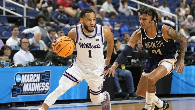 Mar 17, 2023; Greensboro, NC, USA; Kansas State Wildcats guard Markquis Nowell (1) controls the ball against Montana State Bobcats guard RaeQuan Battle (21) in the second half at Greensboro Coliseum. Mandatory Credit: Bob Donnan-USA TODAY Sports