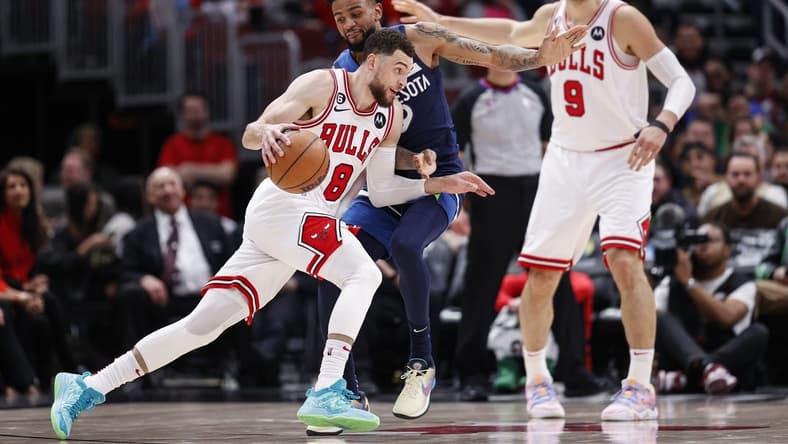 Mar 17, 2023; Chicago, Illinois, USA; Chicago Bulls guard Zach LaVine (8) drives to the basket against Minnesota Timberwolves guard Nickeil Alexander-Walker (9) during the second half at United Center. Mandatory Credit: Kamil Krzaczynski-USA TODAY Sports