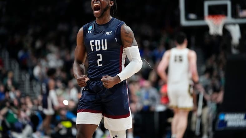 Mar 17, 2023; Columbus, Ohio, USA; Fairleigh Dickinson Knights guard Demetre Roberts (2) celebrates during the first round of the NCAA men s basketball tournament against the Purdue Boilermakers at Nationwide Arena. The Fairleigh Dickinson Knights won 63-58. Mandatory Credit: Adam Cairns-The Columbus Dispatch
Basketball Ncaa Men S Basketball Tournament