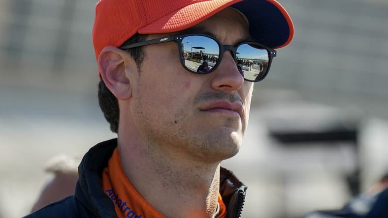 Mar 18, 2023; Hampton, Georgia, USA; NASCAR Cup Series driver Joey Logano (22) watches the scoreboard during qualifying at Atlanta Motor Speedway. Mandatory Credit: David Yeazell-USA TODAY Sports