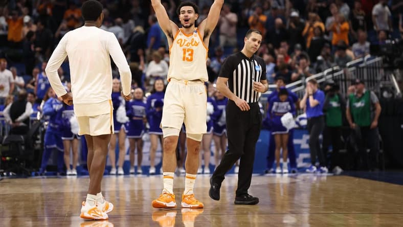 Mar 18, 2023; Orlando, FL, USA; Tennessee Volunteers forward Olivier Nkamhoua (13) celebrates after defeating the Duke Blue Devils in the second round of the 2023 NCAA Tournament at Legacy Arena. Mandatory Credit: Matt Pendleton-USA TODAY Sports
