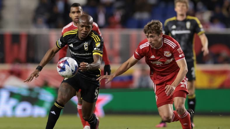 Mar 18, 2023; Harrison, New Jersey, USA; New York Red Bulls midfielder Daniel Edelman (75) fights for the the ball against New York Red Bulls defender Kyle Duncan (6) at Red Bull Arena. Mandatory Credit: Vincent Carchietta-USA TODAY Sports
