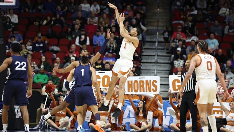 Mar 18, 2023; Des Moines, IA, USA; Texas Longhorns forward Dylan Disu (1) shoots the ball against against the Penn State Nittany Lions during the second half at Wells Fargo Arena. Mandatory Credit: Reese Strickland-USA TODAY Sports
