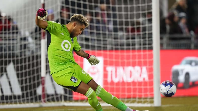 Mar 18, 2023; Commerce City, Colorado, USA; Minnesota United FC goalkeeper Dayne St. Clair kicks the ball against the Colorado Rapids at Dick's Sporting Goods Park. Mandatory Credit: Ron Chenoy-USA TODAY Sports