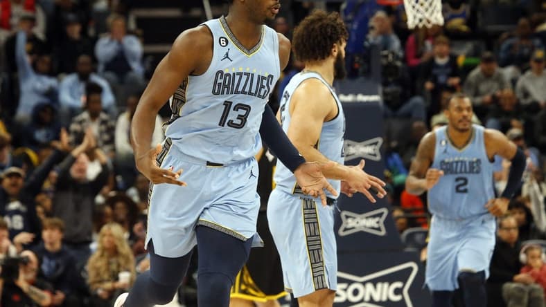 Mar 18, 2023; Memphis, Tennessee, USA; Memphis Grizzlies forward Jaren Jackson Jr. (13) reacts after a basket during the second half against the Golden State Warriors at FedExForum. Mandatory Credit: Petre Thomas-USA TODAY Sports