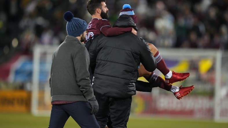 Mar 18, 2023; Commerce City, Colorado, USA; Colorado Rapids midfielder Jack Price (19) is taken off the pitch against the Minnesota United FC at Dick's Sporting Goods Park. Mandatory Credit: Ron Chenoy-USA TODAY Sports