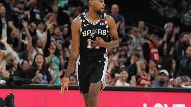 Mar 19, 2023; San Antonio, Texas, USA; San Antonio Spurs guard Blake Wesley (14) celebrates in the second half against the Atlanta Hawks at the AT&T Center. Mandatory Credit: Daniel Dunn-USA TODAY Sports