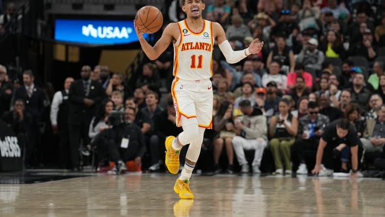Mar 19, 2023; San Antonio, Texas, USA; Atlanta Hawks guard Trae Young (11) dribbles the ball up the court in the second half against the San Antonio Spurs at the AT&T Center. Mandatory Credit: Daniel Dunn-USA TODAY Sports