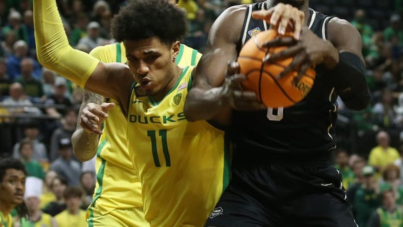 Oregon's Rivaldo Soares, left, battles Central Florida's Lahat Thioune ifor a rebound during their NIT game in Eugene.
Ncaa Basketball Oregon Ucf In The Nit Ucf At Oregon