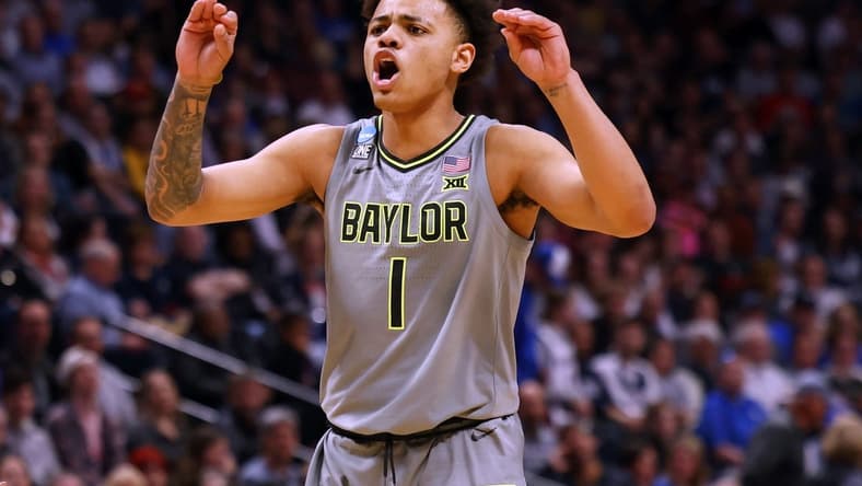 Mar 19, 2023; Denver, CO, USA; Baylor Bears guard Keyonte George (1) reacts in the second half against the Creighton Bluejays at Ball Arena. Mandatory Credit: Michael Ciaglo-USA TODAY Sports