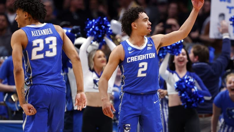 Mar 19, 2023; Denver, CO, USA; Creighton Bluejays guard Ryan Nembhard (2) and guard Trey Alexander (23) celebrate in the second half against the Baylor Bears at Ball Arena. Mandatory Credit: Michael Ciaglo-USA TODAY Sports