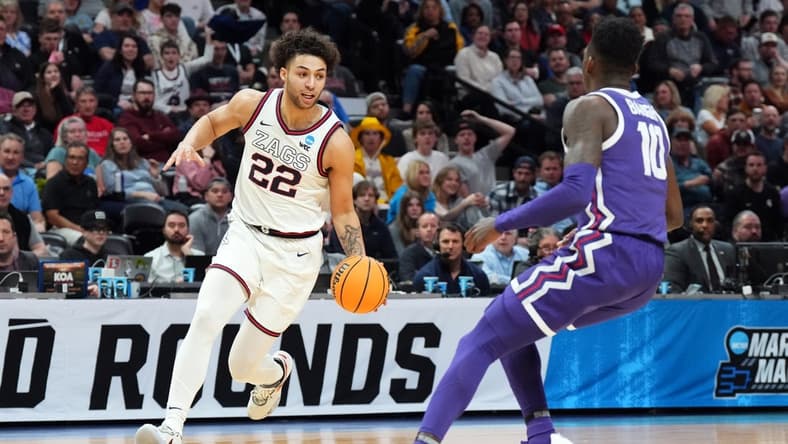 Mar 19, 2023; Denver, CO, USA; Gonzaga Bulldogs forward Anton Watson (22) controls the ball against TCU Horned Frogs guard Damion Baugh (10) in the second half at Ball Arena. Mandatory Credit: Ron Chenoy-USA TODAY Sports